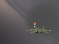 The C-130 bursts into brilliant orange flame, detonating in my path.