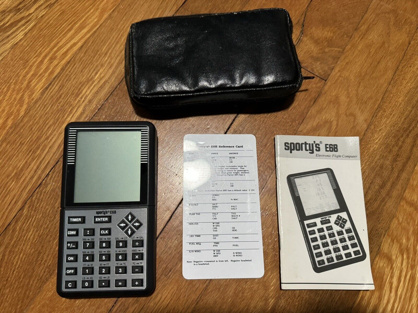 Sporty’s E6B Electronic Flight Computer With Case, Manual And Reference Card