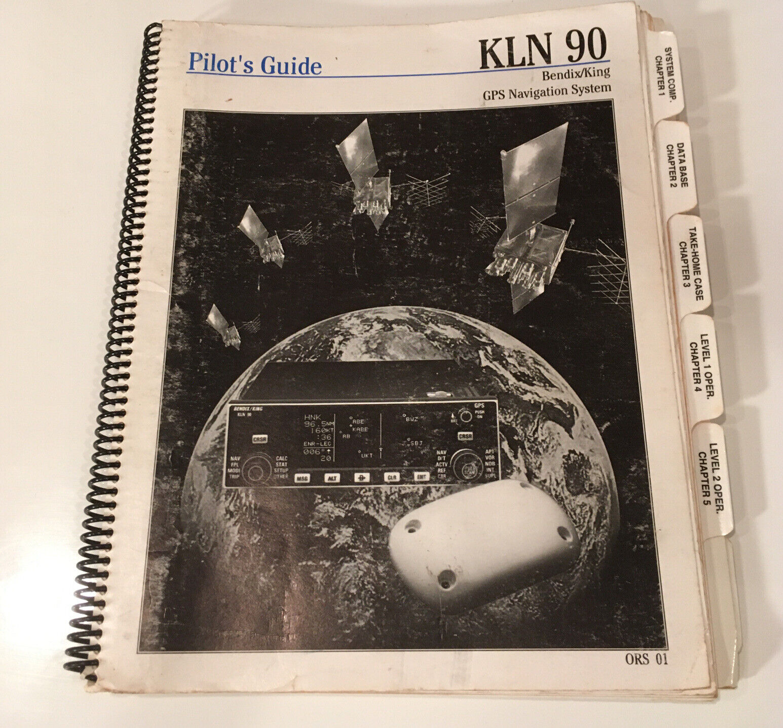 KLN 90 Pilots Guide Manual and the Sales Info Booklet
